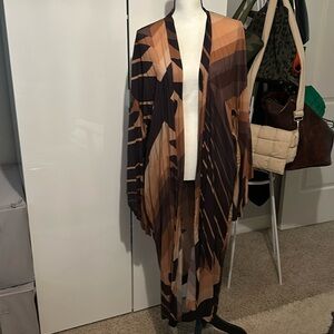 The prettiest duster! Gorgeous pattern. Never worn.